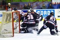 Roland Fink goalie and Gruber Ingemar of Renon Ritten Sport and Tommaso Goi of HC Milano during a game Royalty Free Stock Photo